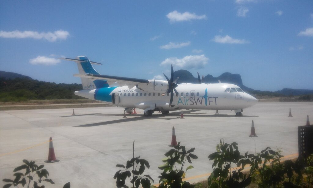 Small turboprop plane at El Nido Lio Airport, Palawan