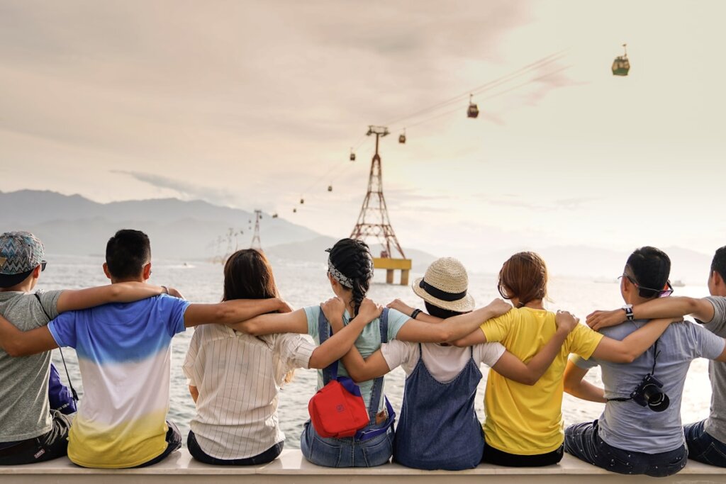 Happy group of friends on a boat enjoying island hopping in El Nido Palawan Philippines