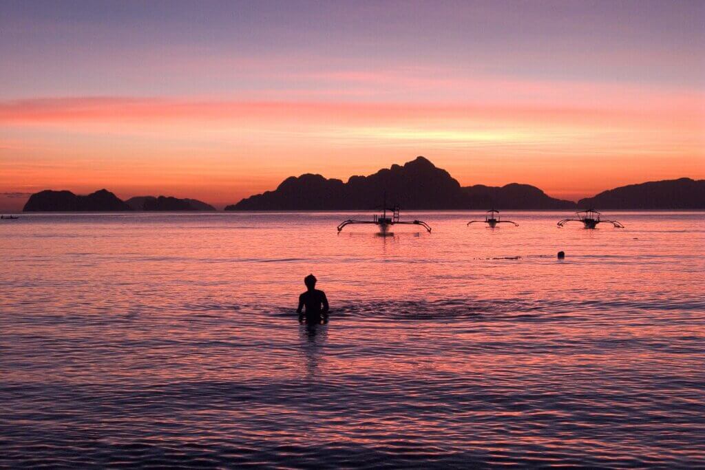 Sunset over the limestone islands of Bacuit Bay in El Nido, Palawan