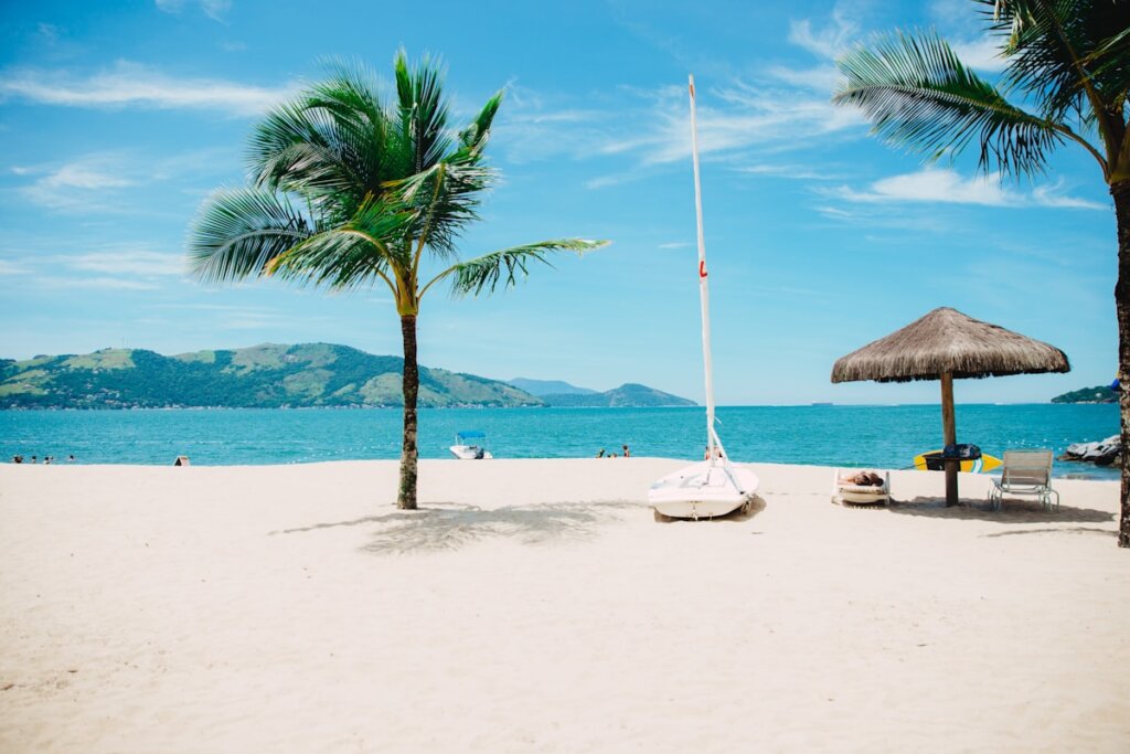 Beach bag with sunscreen snorkel mask water bottle and hat for island hopping in El Nido Palawan