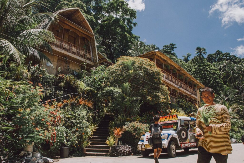 Traditional nipa hut with thatched roof in the Philippines