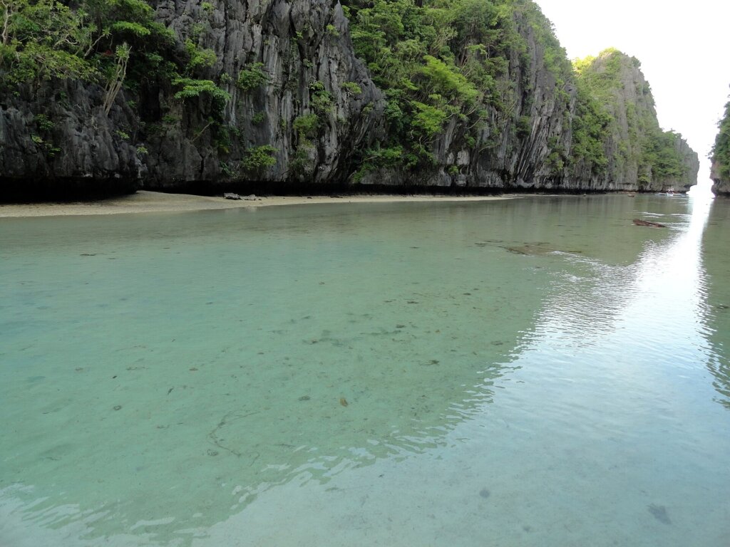 Big Lagoon in El Nido with kayaks and karst cliffs