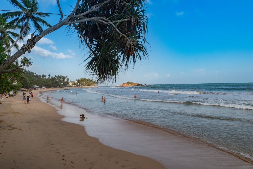 Mirissa beach on Sri Lanka south coast, compared with El Nido for a tropical beach holiday