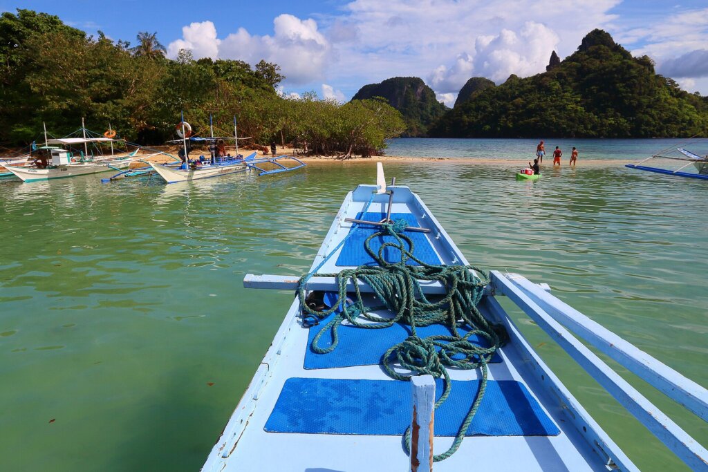 Island hopping bangka boats on an El Nido tour in Bacuit Bay, Palawan