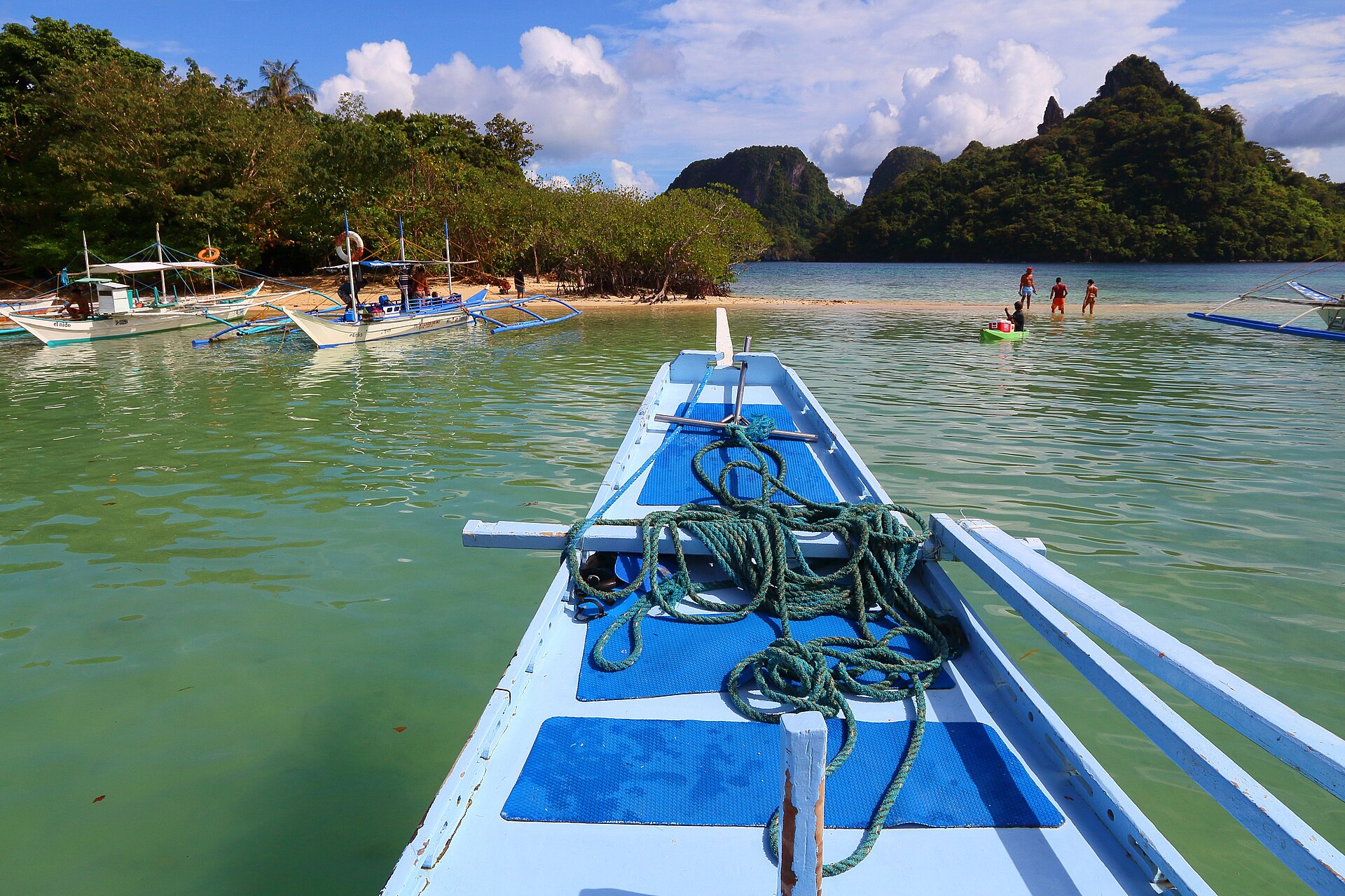 Island hopping bangka boats on an El Nido tour in Bacuit Bay, Palawan