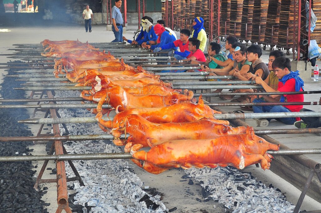 Whole roasted lechon pig served at a Filipino celebration