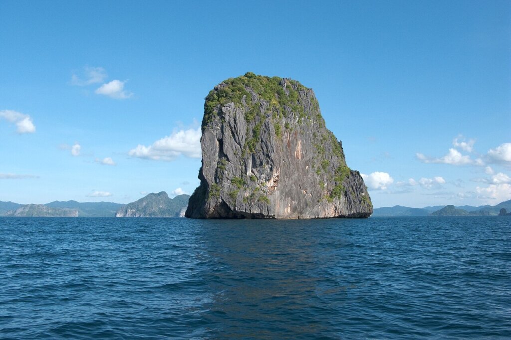 Limestone karst islands in the sea between El Nido and Linapacan, Palawan