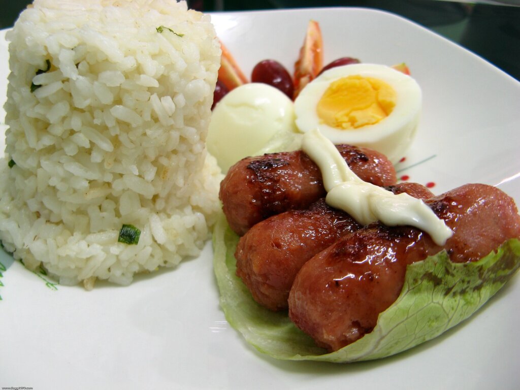 Filipino sausage breakfast with garlic fried rice and egg