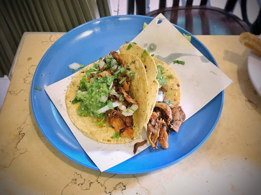 Al pastor tacos on a plate, the dish most Mexican-food seekers look for in El Nido