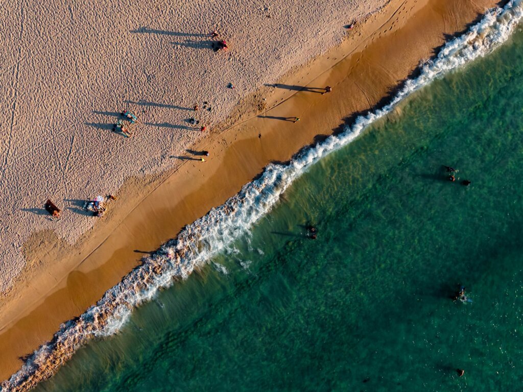 Golden sand and turquoise water at Nacpan Beach in El Nido, Palawan