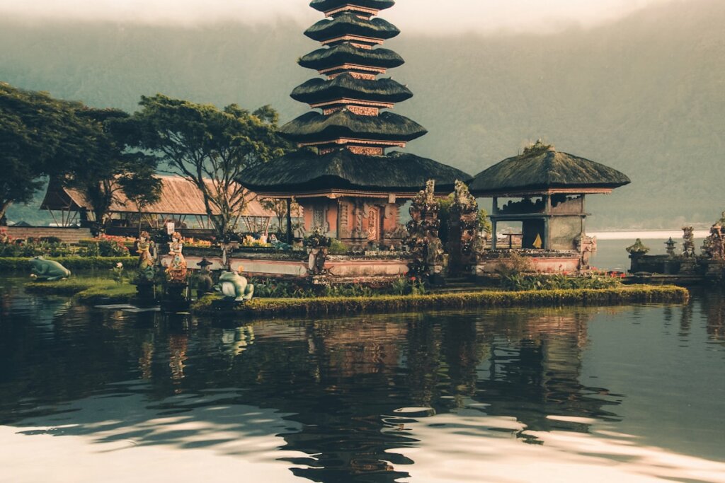 Split view comparing Palawan Philippines limestone cliffs and Bali Indonesia tropical scenery for travel comparison