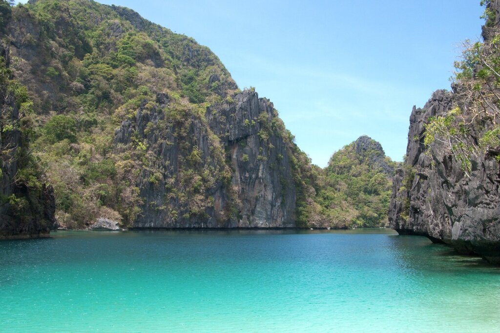 Limestone islands rising from Bacuit Bay in El Nido, Palawan